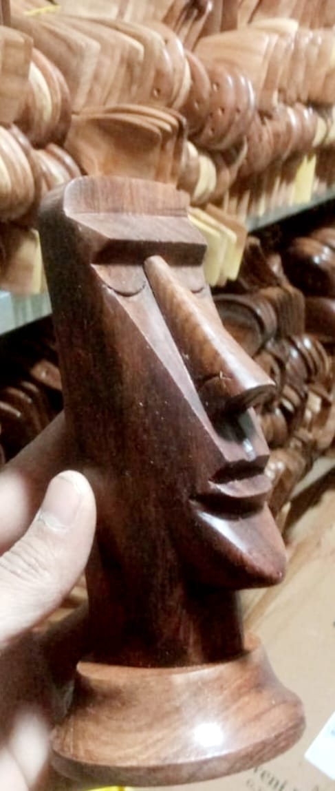 Chisel work on a carved sheesham component